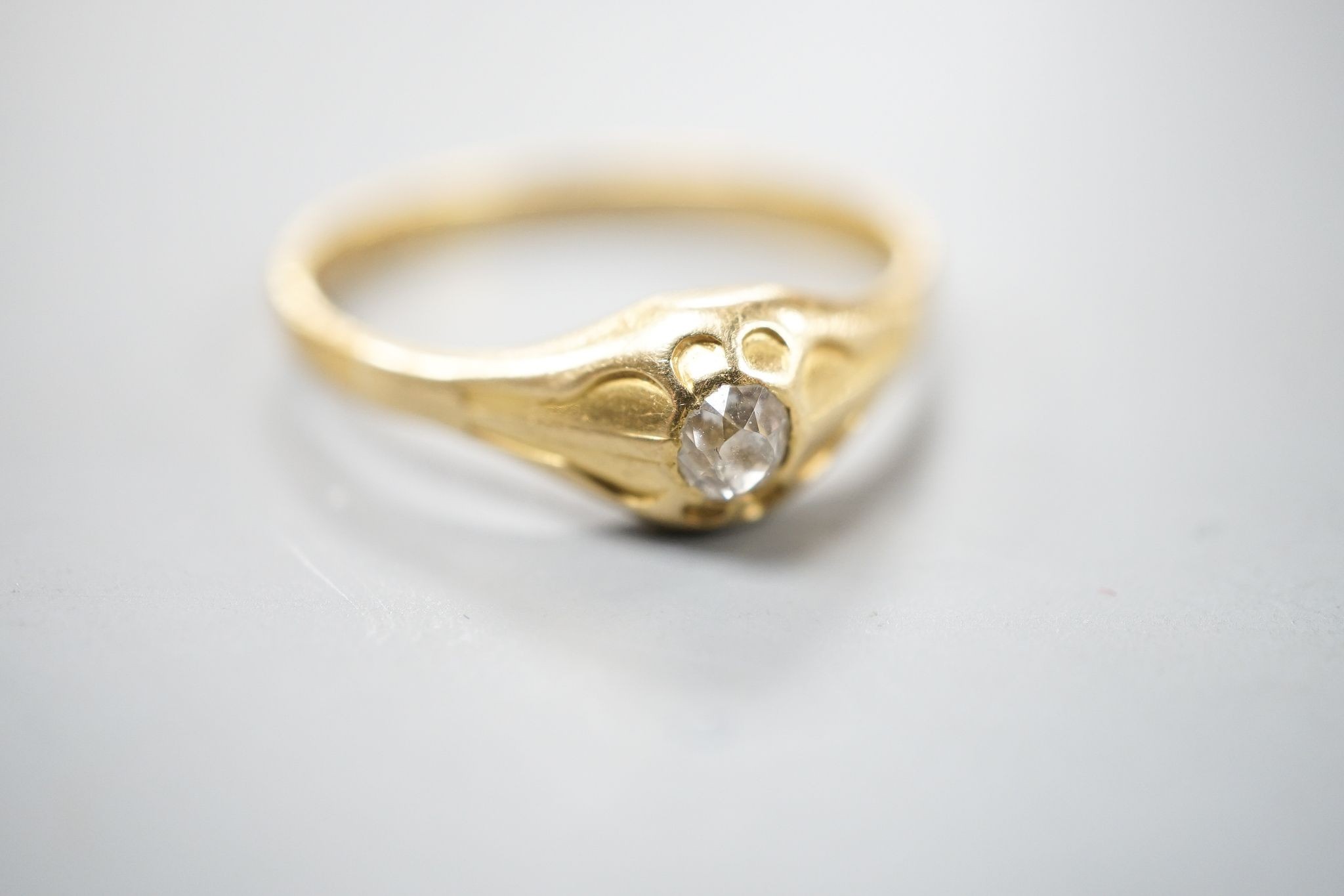 A Victorian 22ct gold and solitaire diamond set ring, London, 1875, size Z, gross weight 5 grams